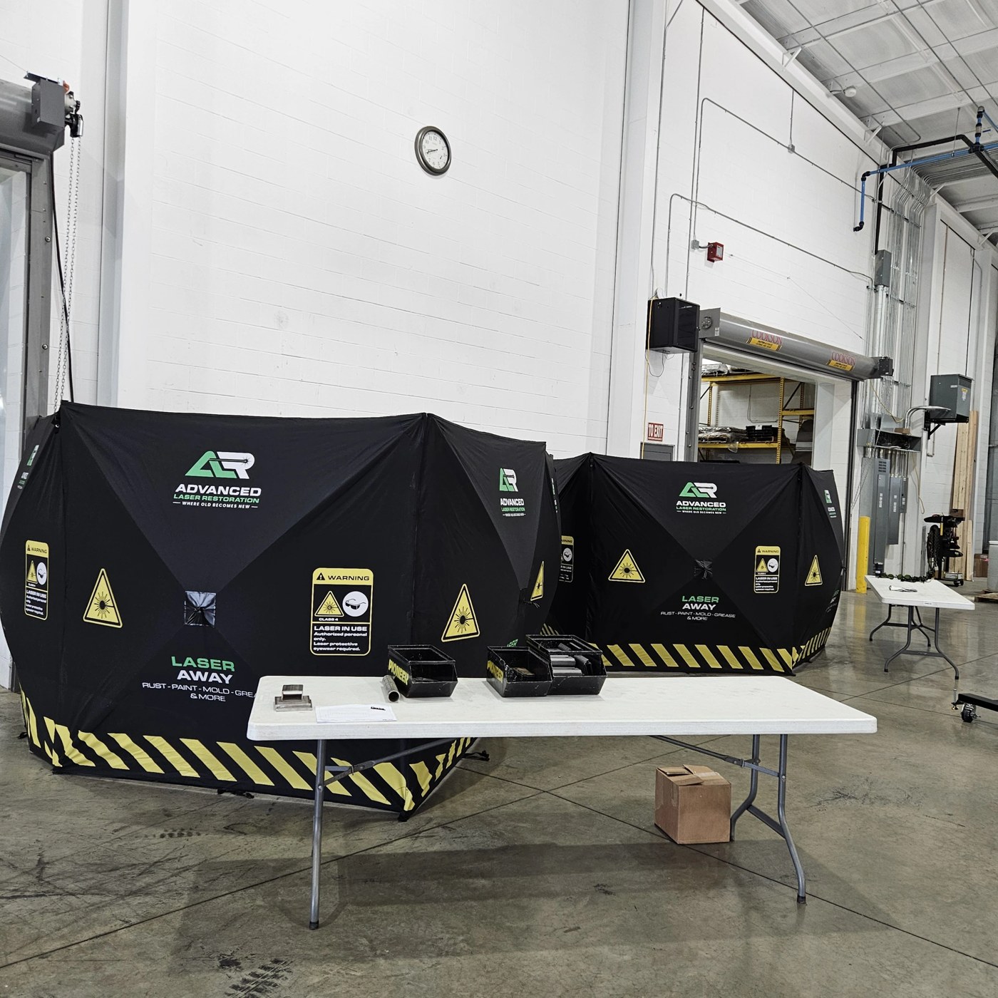 ALR Laser Away demonstration enclosures on the Flextur facility floor